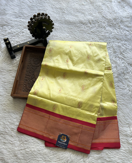 Narayanpet Silk Saree Lemon Yellow Colored Complemented with a Zari Border. - Sampradaya Designer Studio