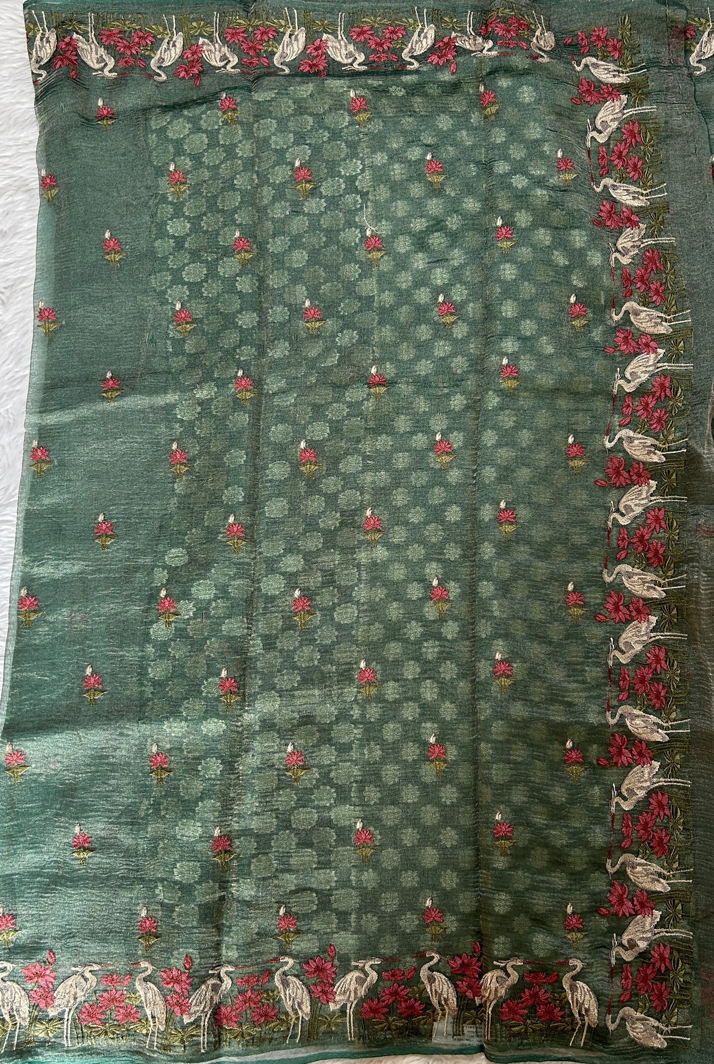 Banarasi Crushed Silk Saree Sea Green Colored Complemented with a Thread Embroidery border. - Sampradaya Designer Studio