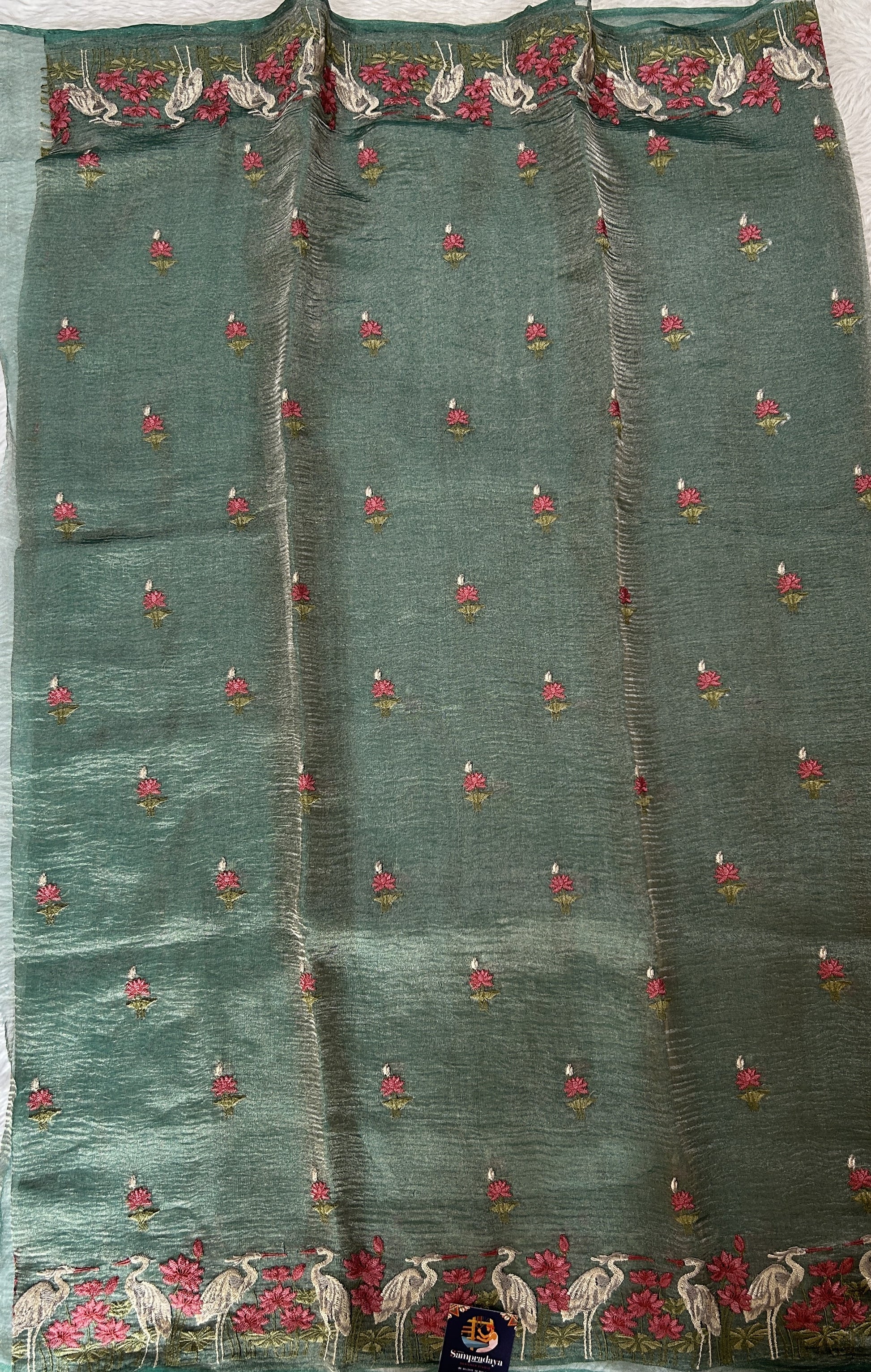 Banarasi Crushed Silk Saree Sea Green Colored Complemented with a Thread Embroidery border. - Sampradaya Designer Studio