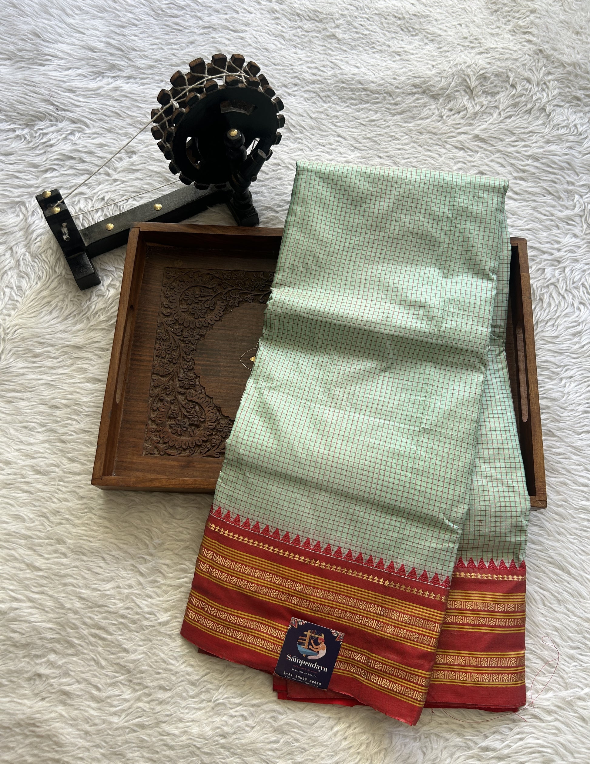 Narayanpet Silk Checks Saree Sea Green Colored Complemented with a Red Zari Border. - Sampradaya Designer Studio