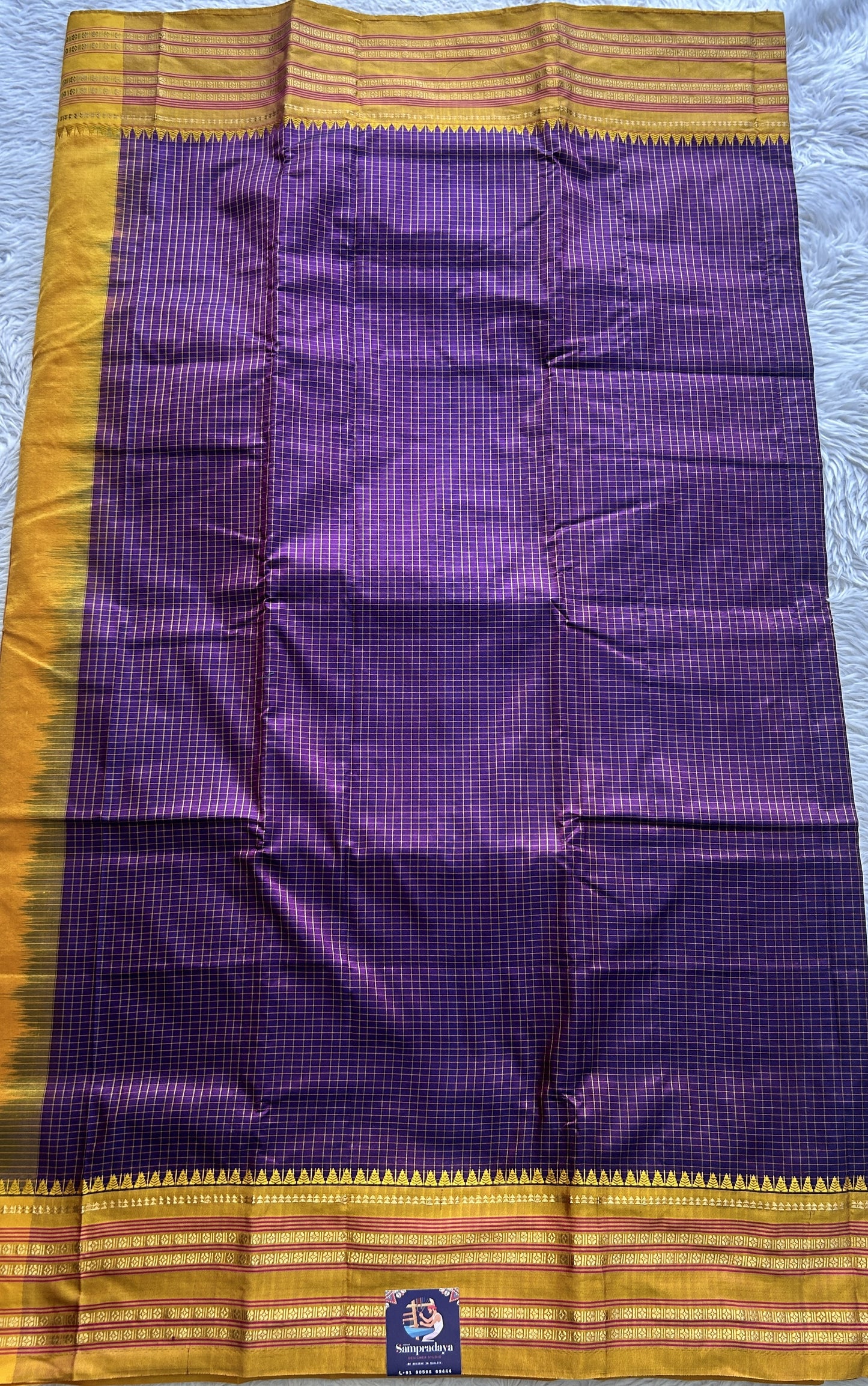 Narayanpet Silk Checks Saree Purple Colored Complemented with a Yellow Zari Border. - Sampradaya Designer Studio