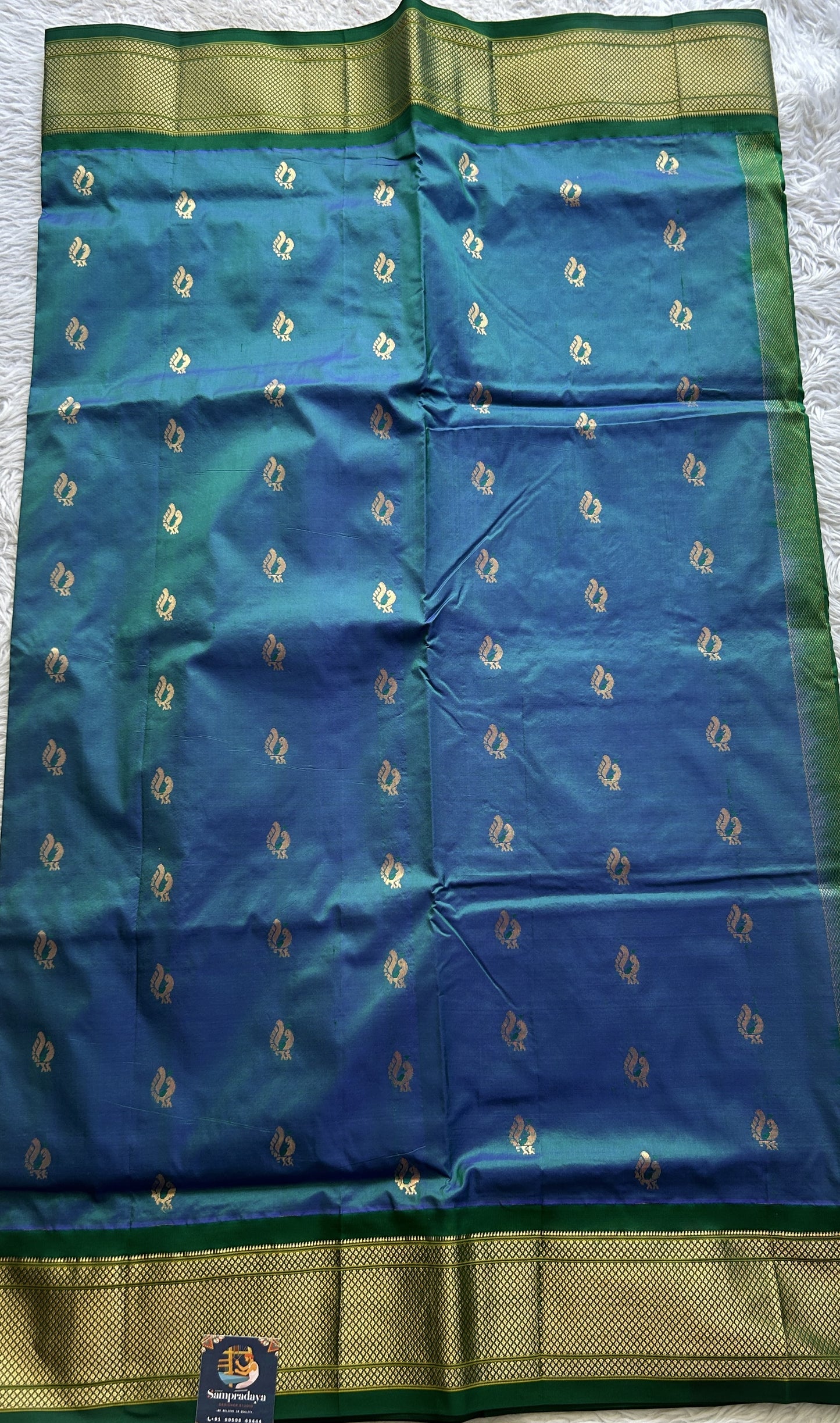Narayanpet Silk Saree Peacock Blue Colored Complemented with a Green Zari Border. - Sampradaya Designer Studio