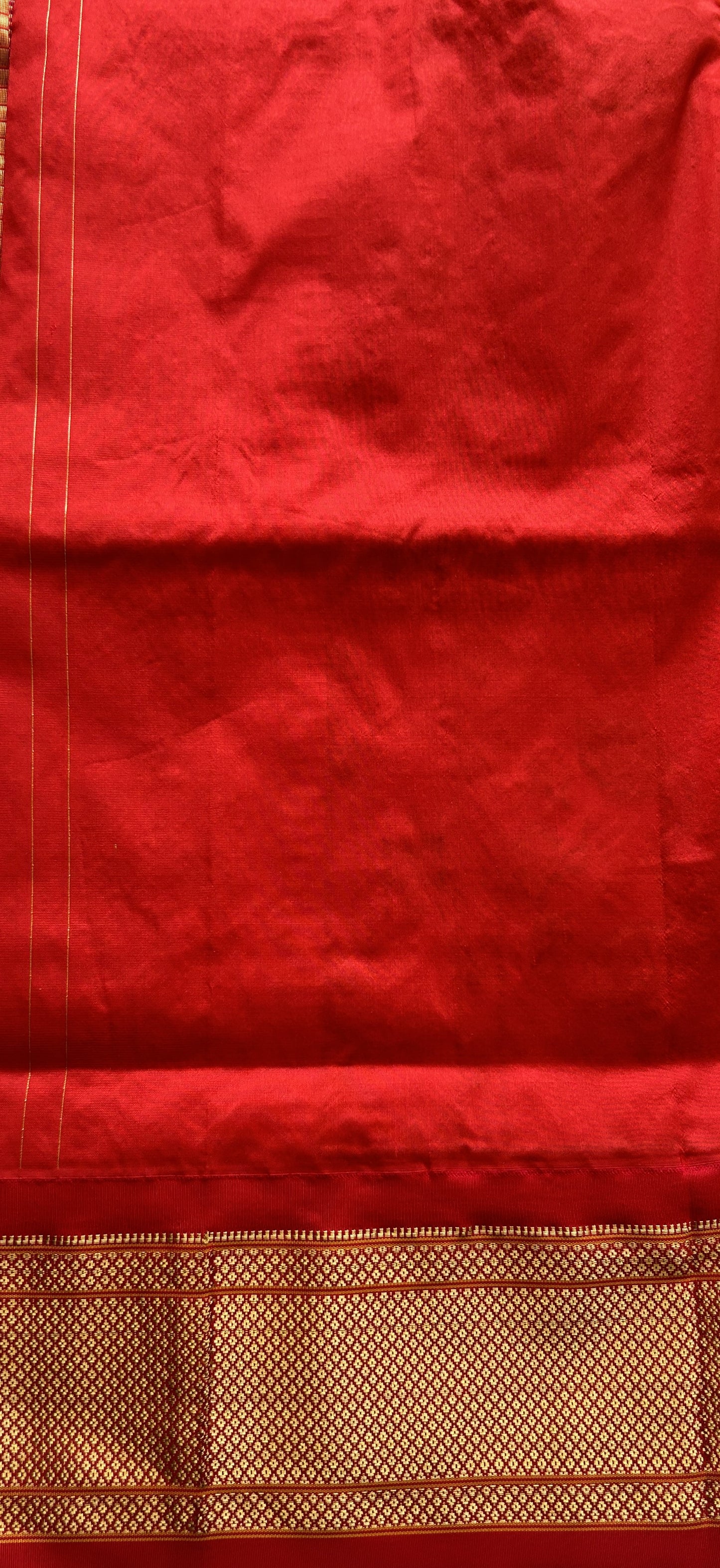 Narayanpet Silk Saree Orange Colored Complemented with a Zari Border. - Sampradaya Designer Studio