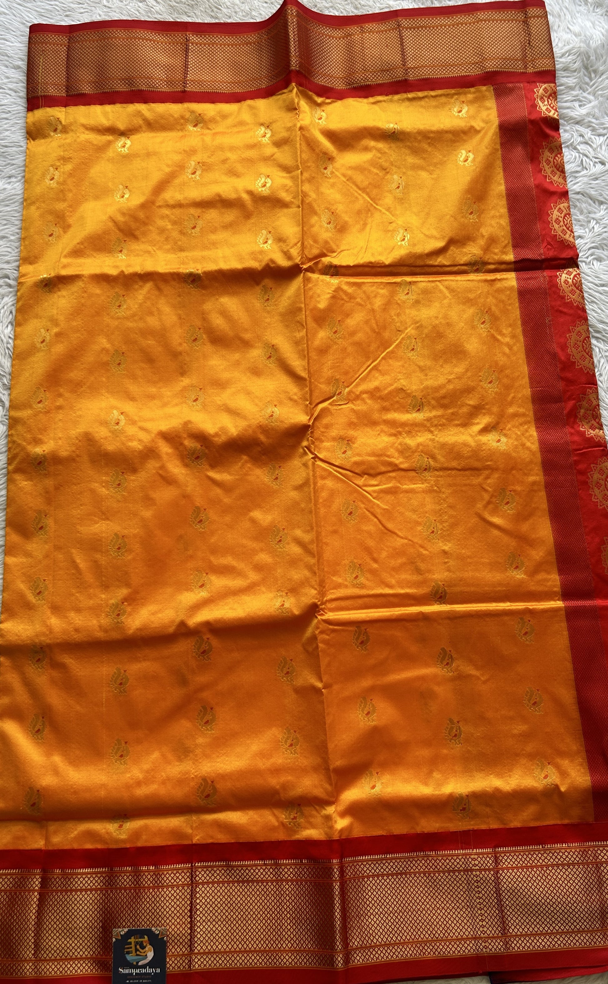 Narayanpet Silk Saree Orange Colored Complemented with a Zari Border. - Sampradaya Designer Studio