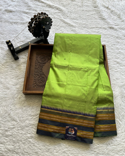 Narayanpet Silk Saree Parrot Green Colored Complemented with a Zari Border. - Sampradaya Designer Studio