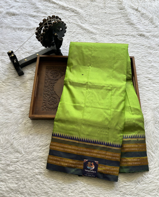 Narayanpet Silk Saree Parrot Green Colored Complemented with a Zari Border. - Sampradaya Designer Studio
