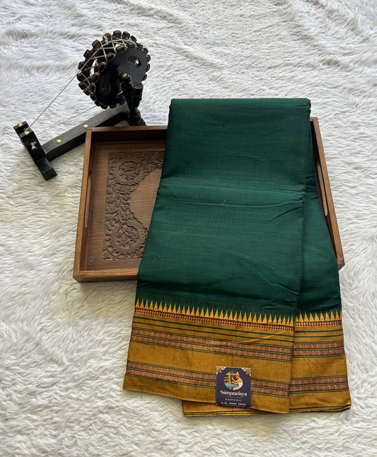 Narayanpet Cotton Saree Dark Green Colored Complemented with a Thread Border. - Sampradaya Designer Studio