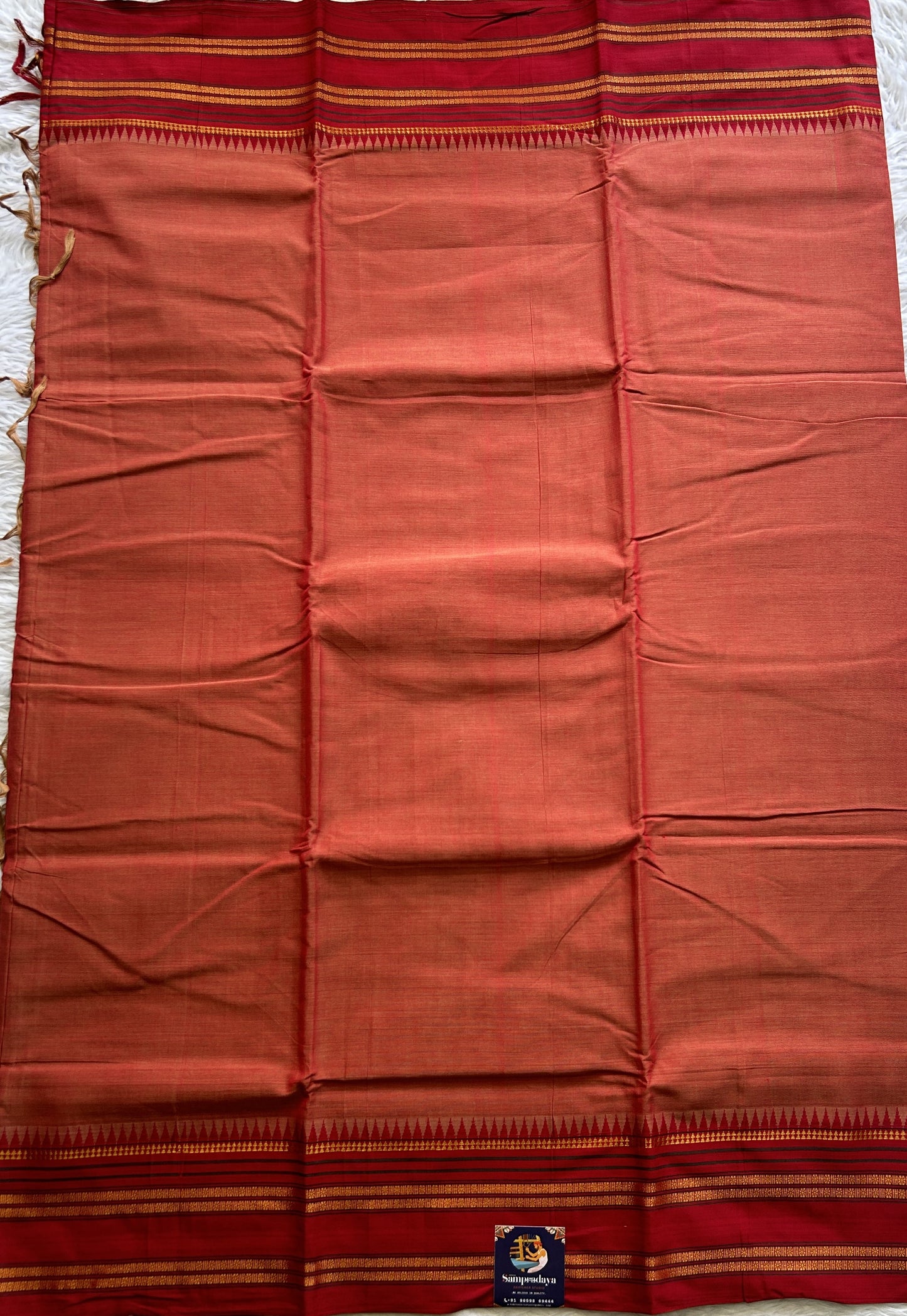 Narayanpet Cotton Saree Rust Colored Complemented with a Thread Border. - Sampradaya Designer Studio
