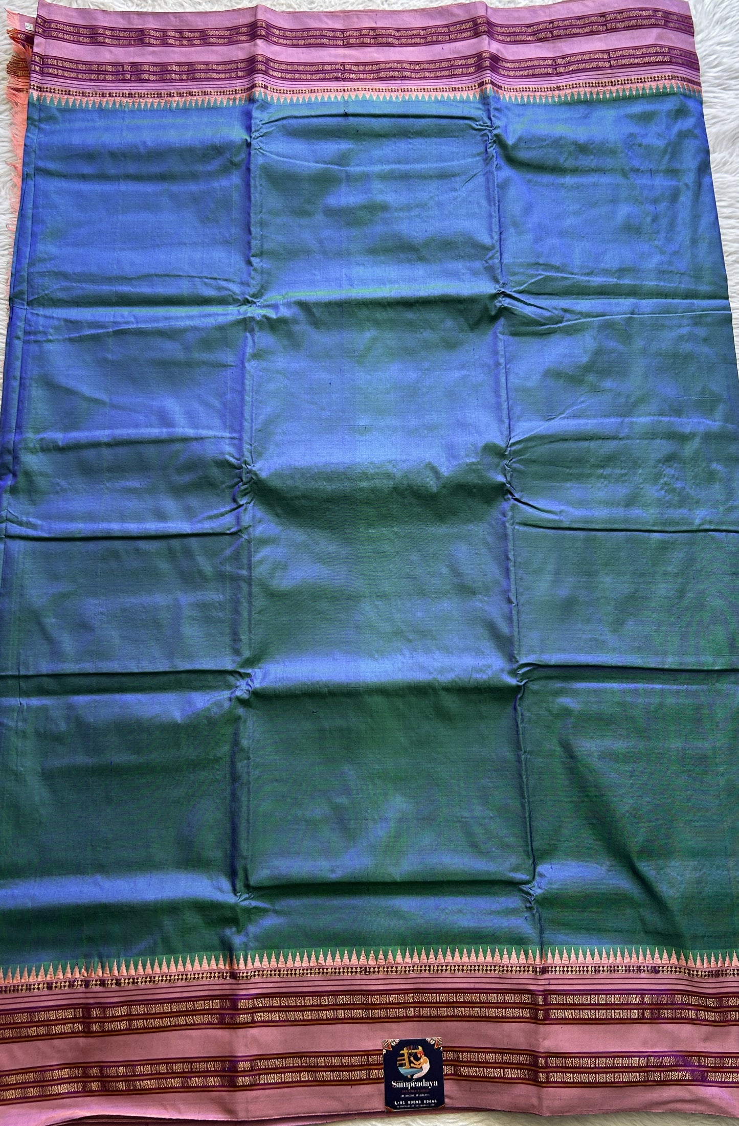 Narayanpet Silk Saree Peacock Blue Colored Complemented with a Baby Pink Zari Border. - Sampradaya Designer Studio