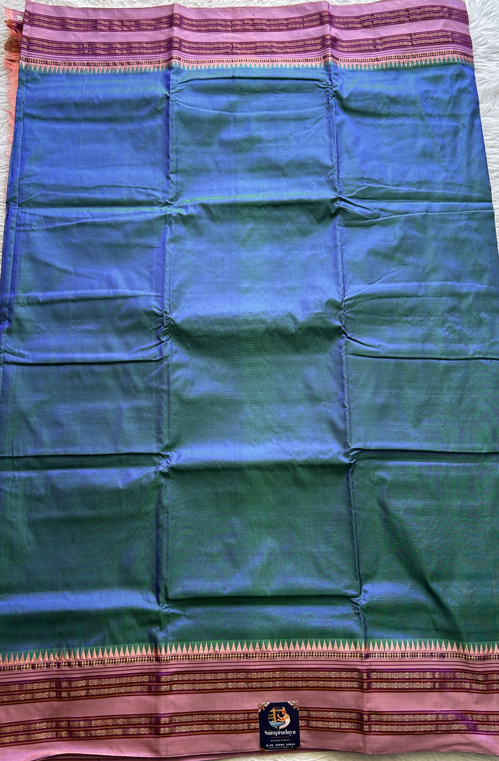 Narayanpet Silk Saree Peacock Blue Colored Complemented with a Baby Pink Zari Border. - Sampradaya Designer Studio