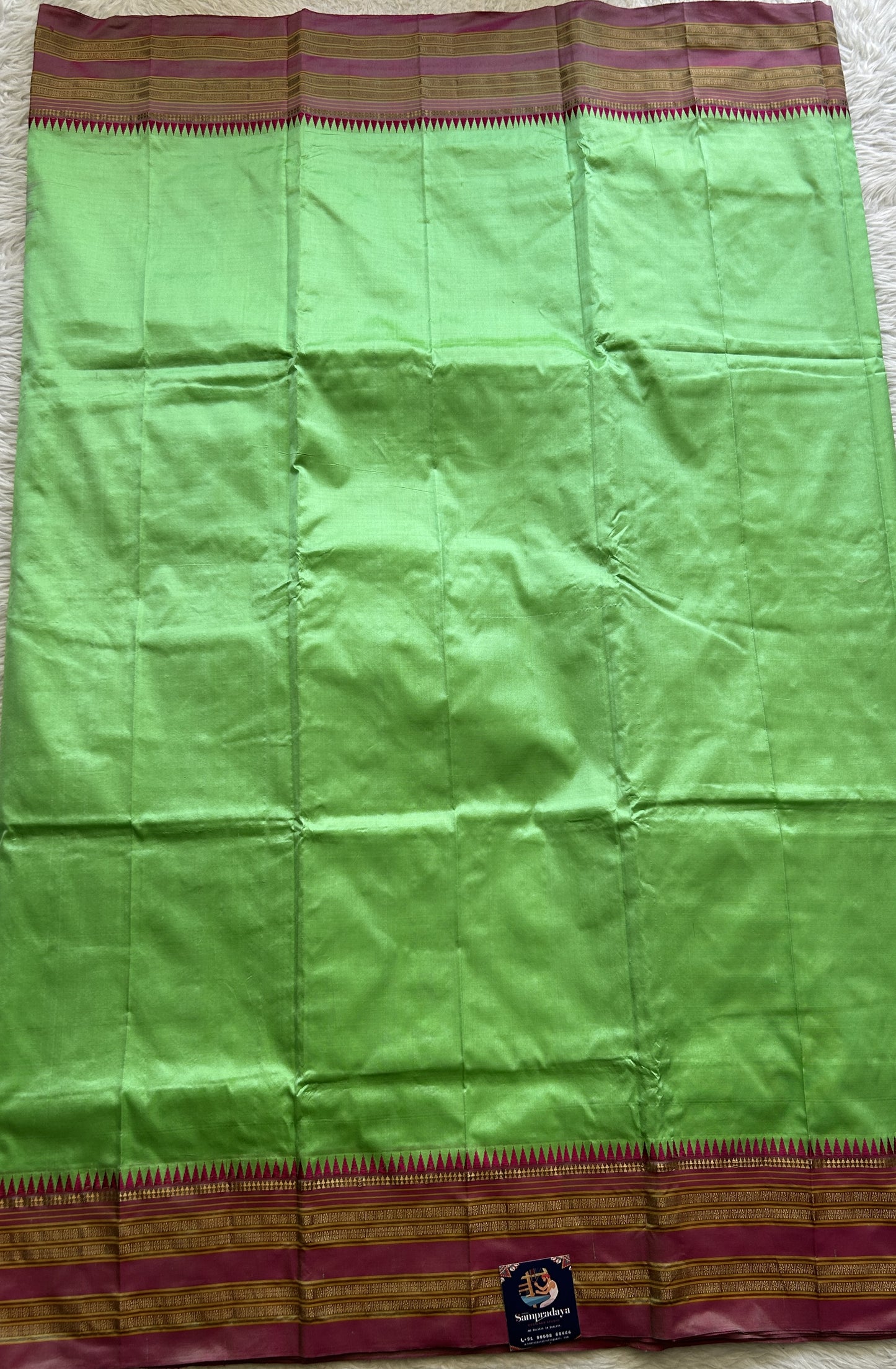 Narayanpet Silk Saree Light Parrot Green Colored Complemented with a Zari Border. - Sampradaya Designer Studio