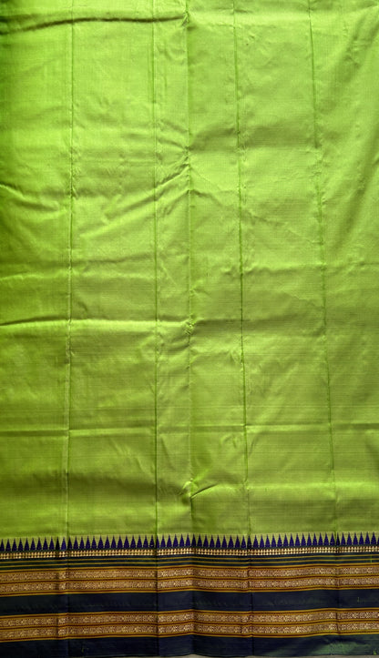 Narayanpet Silk Saree Parrot Green Colored Complemented with a Zari Border. - Sampradaya Designer Studio