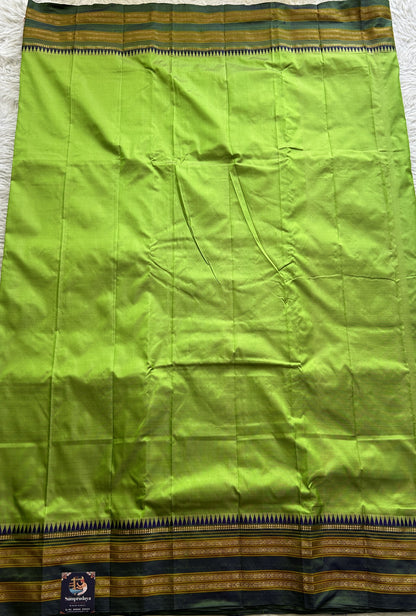 Narayanpet Silk Saree Parrot Green Colored Complemented with a Zari Border. - Sampradaya Designer Studio