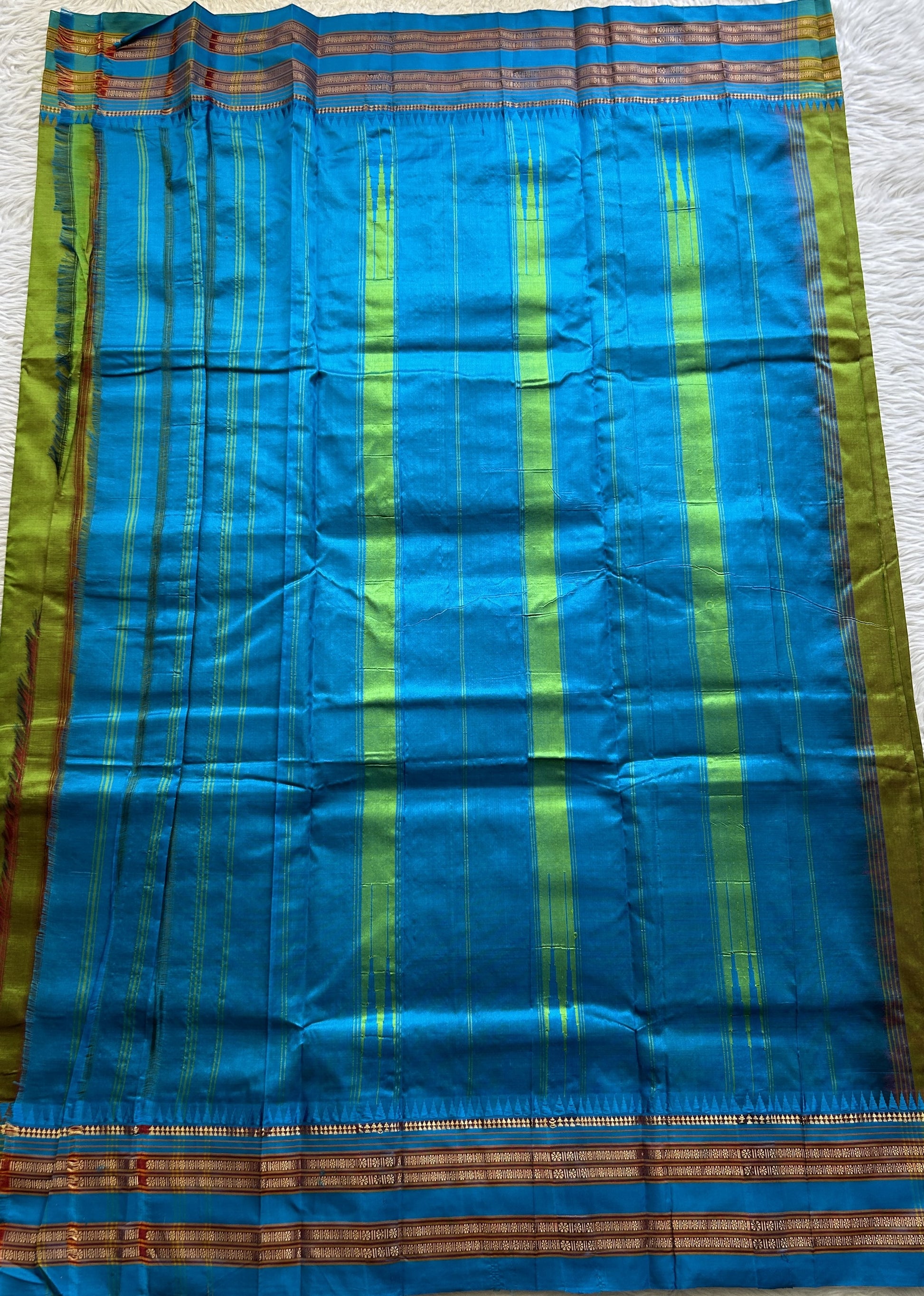 Narayanpet Silk Saree Olive Green Colored Complemented with a Zari Border. - Sampradaya Designer Studio