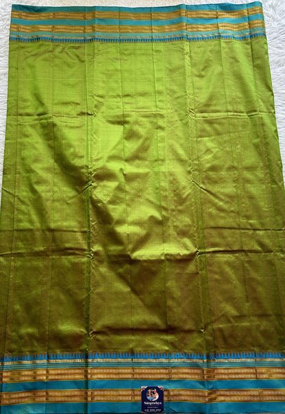 Narayanpet Silk Saree Olive Green Colored Complemented with a Zari Border. - Sampradaya Designer Studio