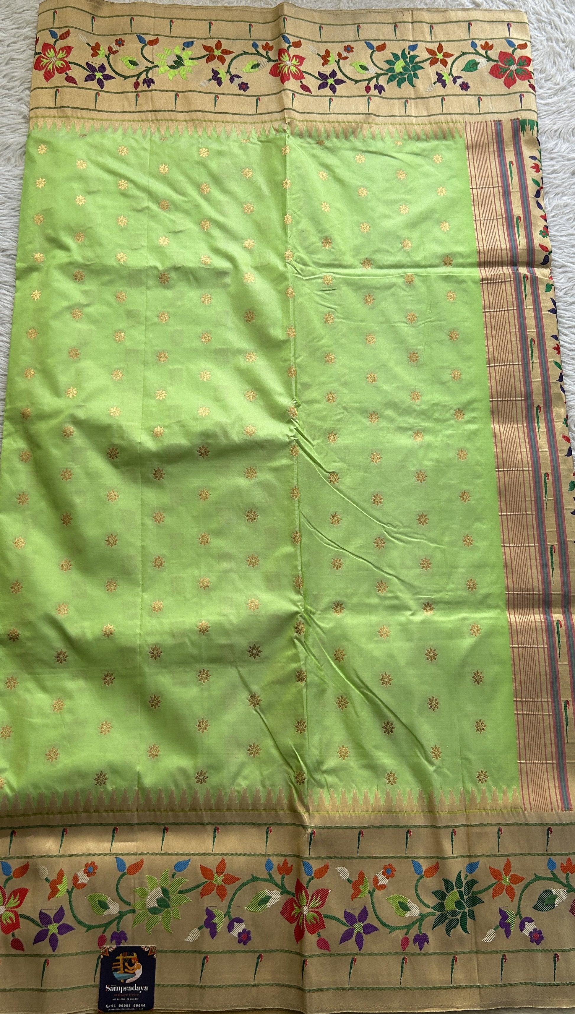Narayanpet Silk Saree Light Green Colored Complemented with a Paithani Border. - Sampradaya Designer Studio