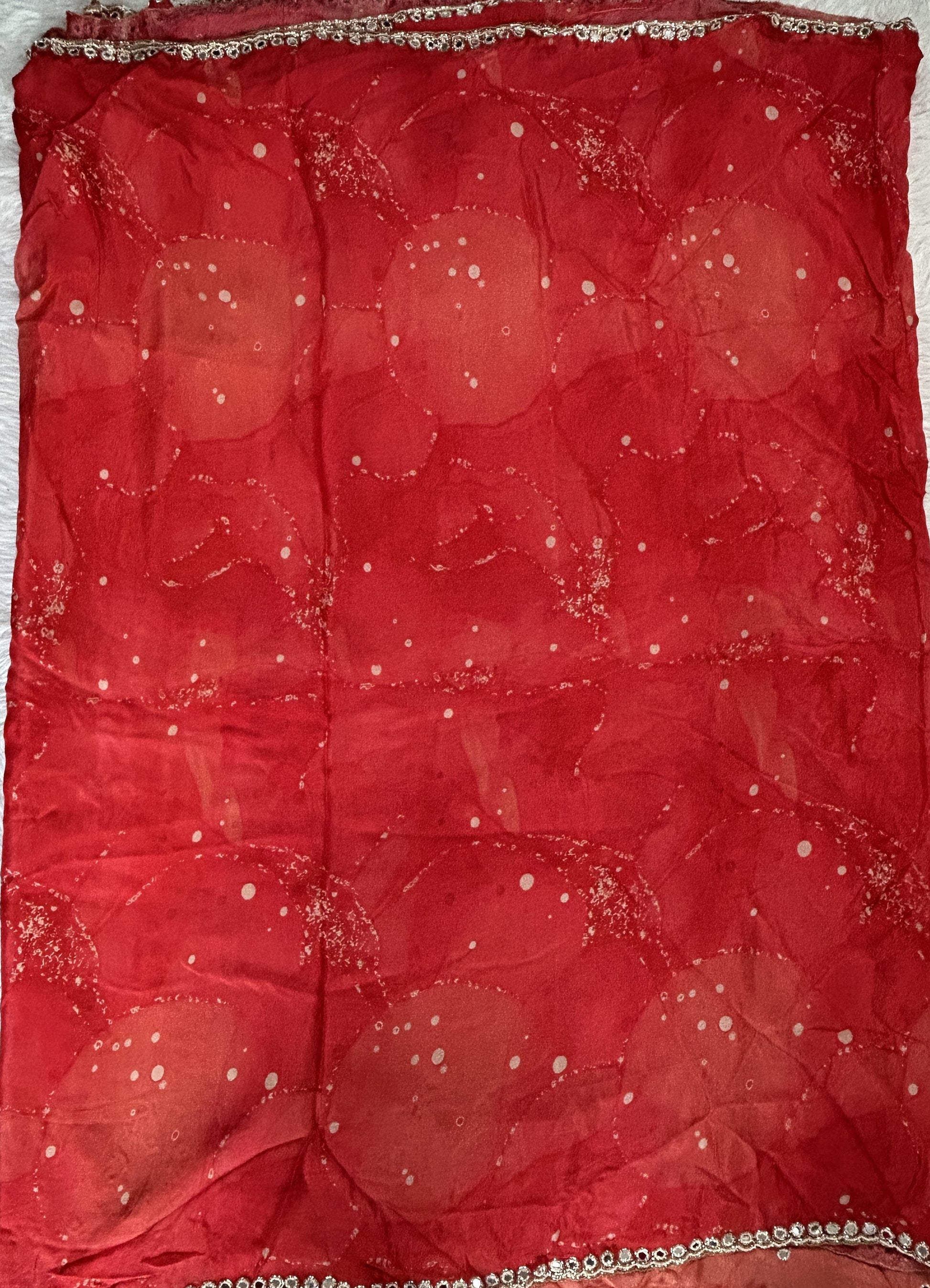 Chiffon Designer Saree Red Color complemented with a Hand Embroidery Border. - Sampradaya Designer Studio