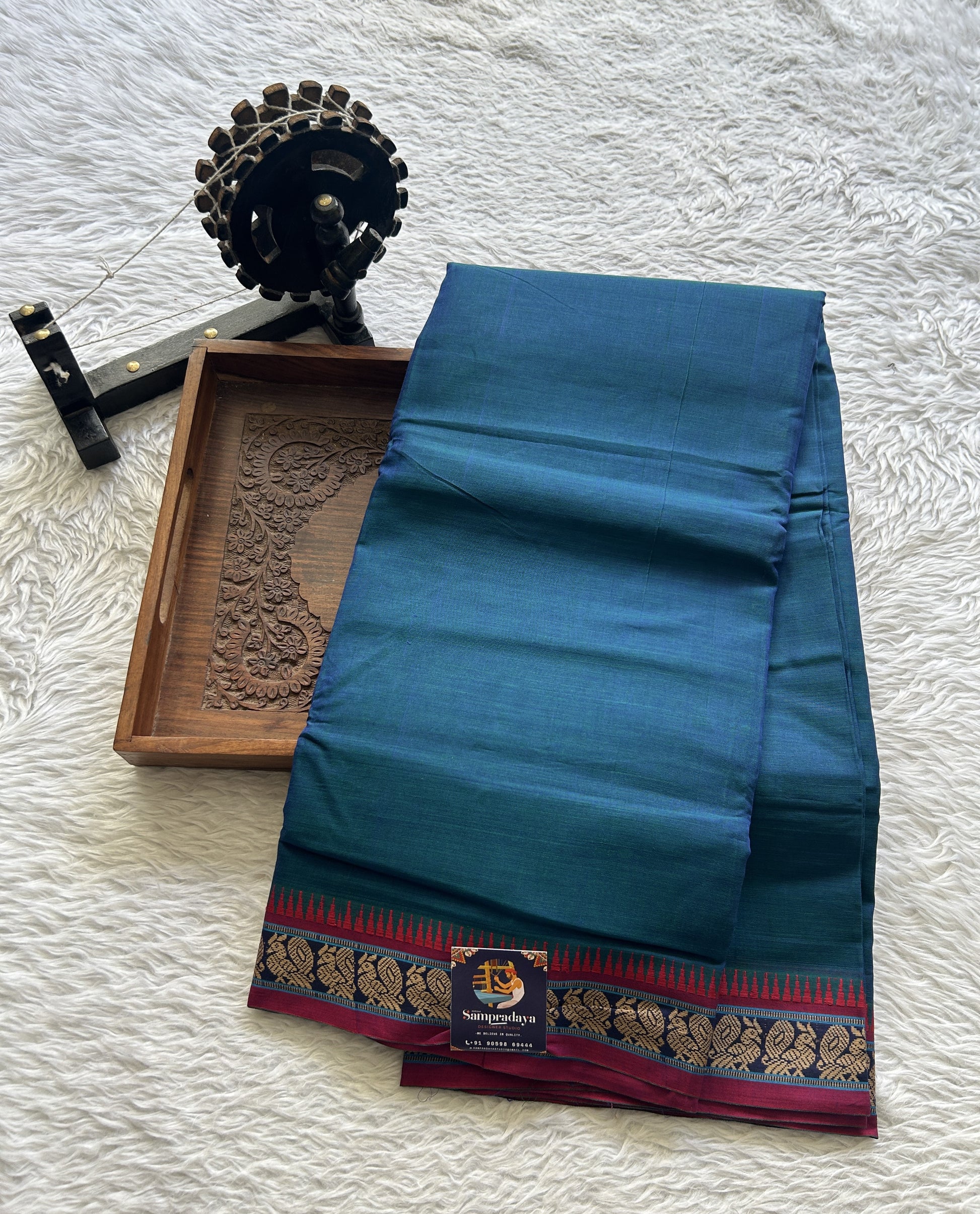Narayanpet Cotton Saree Peacock Blue Colored Complemented with a Thread Border. - Sampradaya Designer Studio