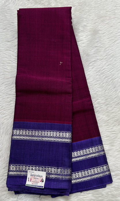 Gadwal Sico Saree Wine colored complemented with a Ink Blue Kanchi Gap Border. - Sampradaya Designer Studio