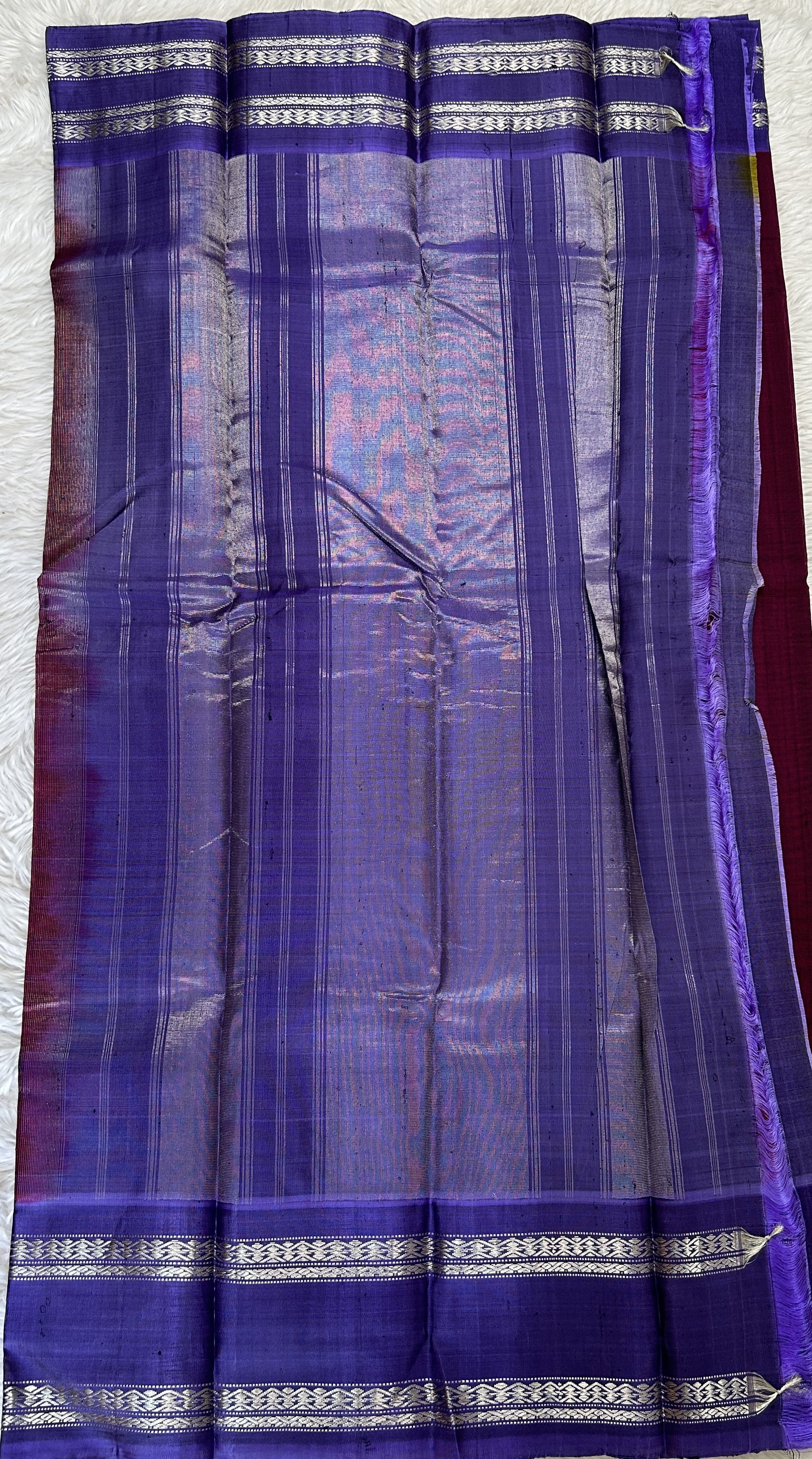 Gadwal Sico Saree Wine colored complemented with a Ink Blue Kanchi Gap Border. - Sampradaya Designer Studio