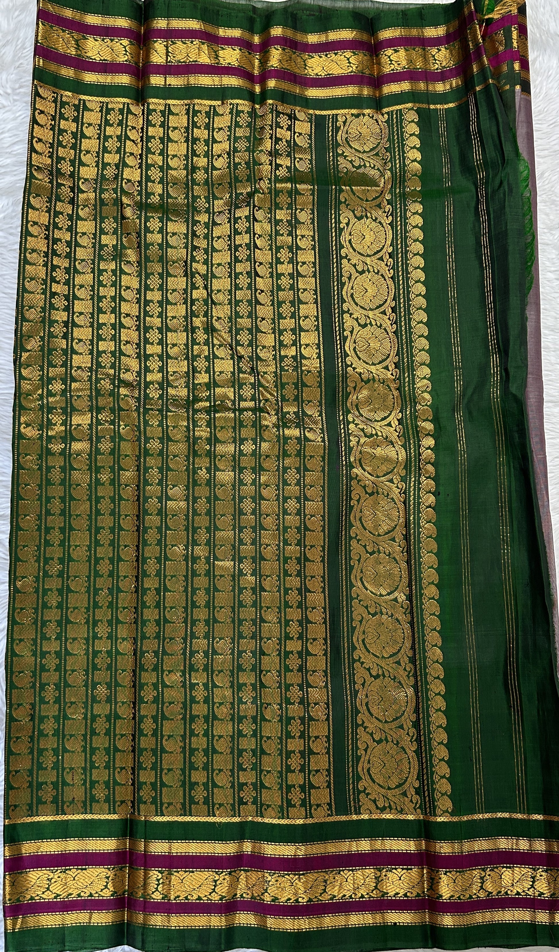 Gadwal Sico Saree Gray colored complemented with a Green Kanchi Gap Border. - Sampradaya Designer Studio