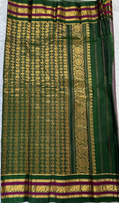 Gadwal Sico Saree Gray colored complemented with a Green Kanchi Gap Border. - Sampradaya Designer Studio