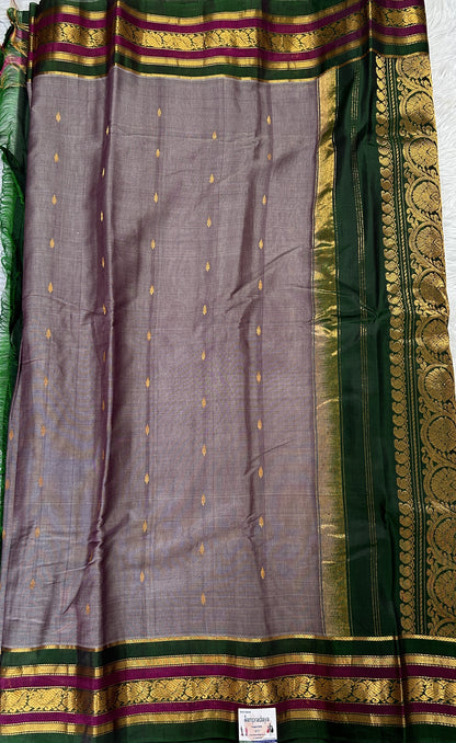 Gadwal Sico Saree Gray colored complemented with a Green Kanchi Gap Border. - Sampradaya Designer Studio