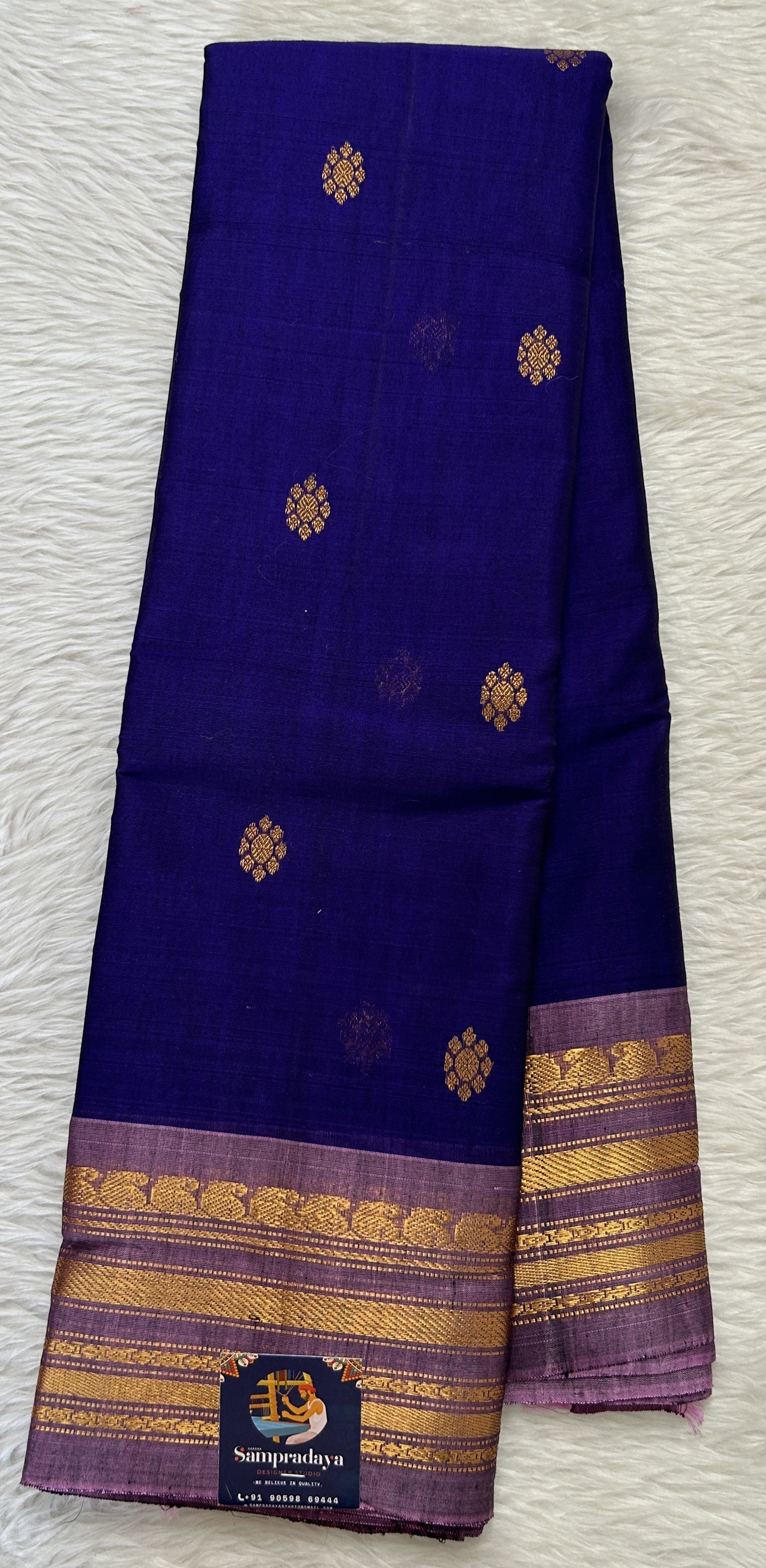 Gadwal Sico Saree Deep Blue colored complemented with a Lavender Kanchi Gap Border. - Sampradaya Designer Studio