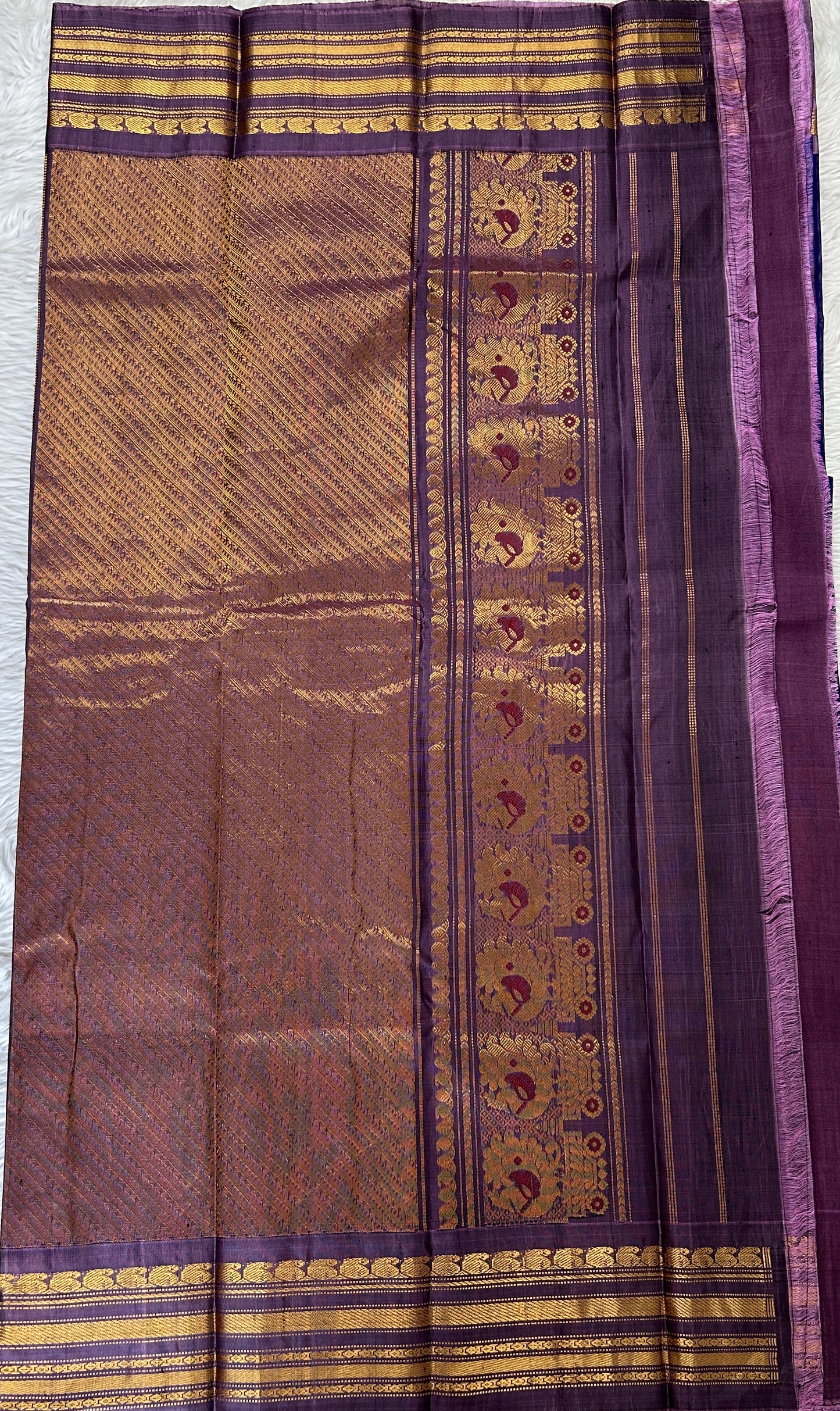 Gadwal Sico Saree Deep Blue colored complemented with a Lavender Kanchi Gap Border. - Sampradaya Designer Studio