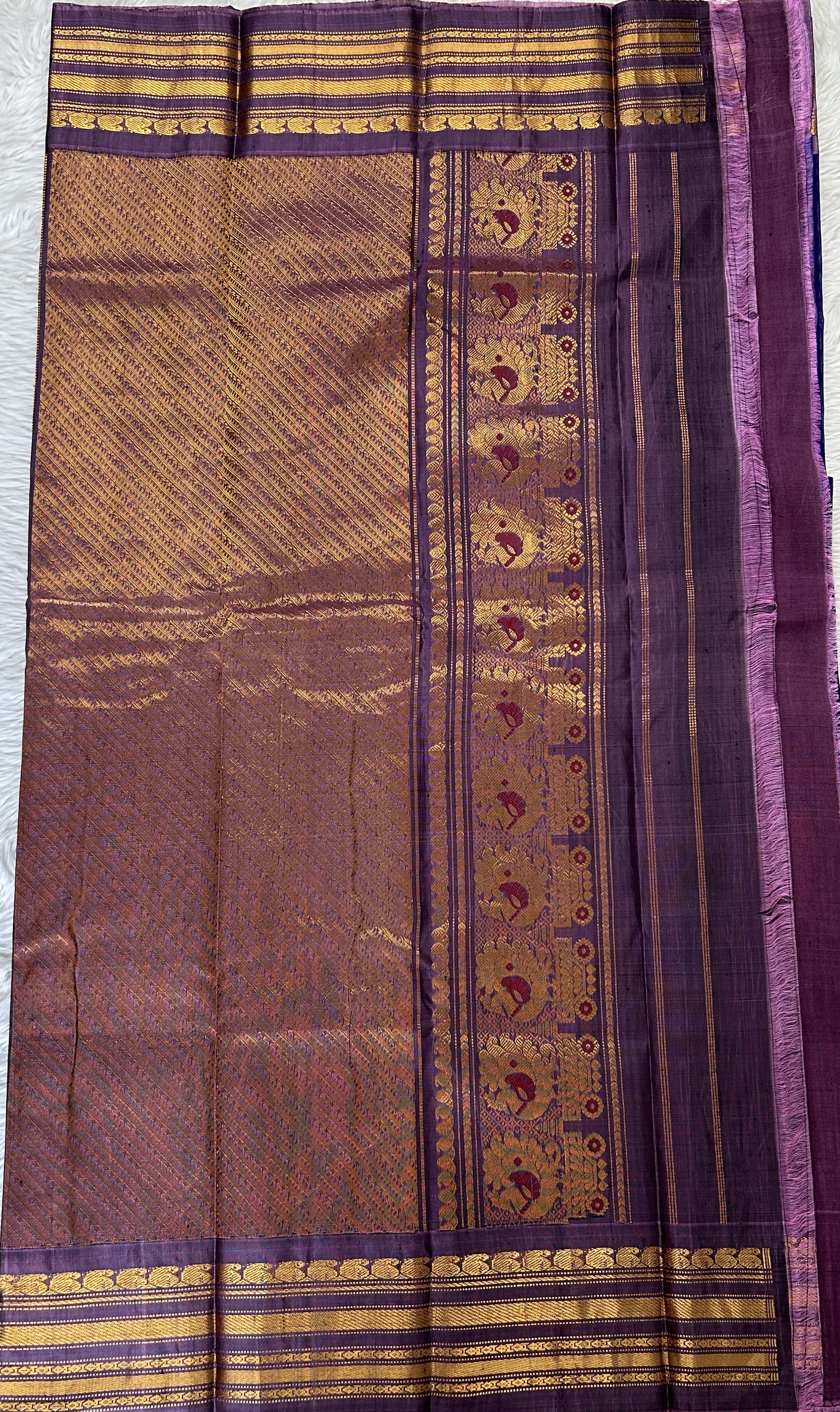 Gadwal Sico Saree Deep Blue colored complemented with a Lavender Kanchi Gap Border. - Sampradaya Designer Studio