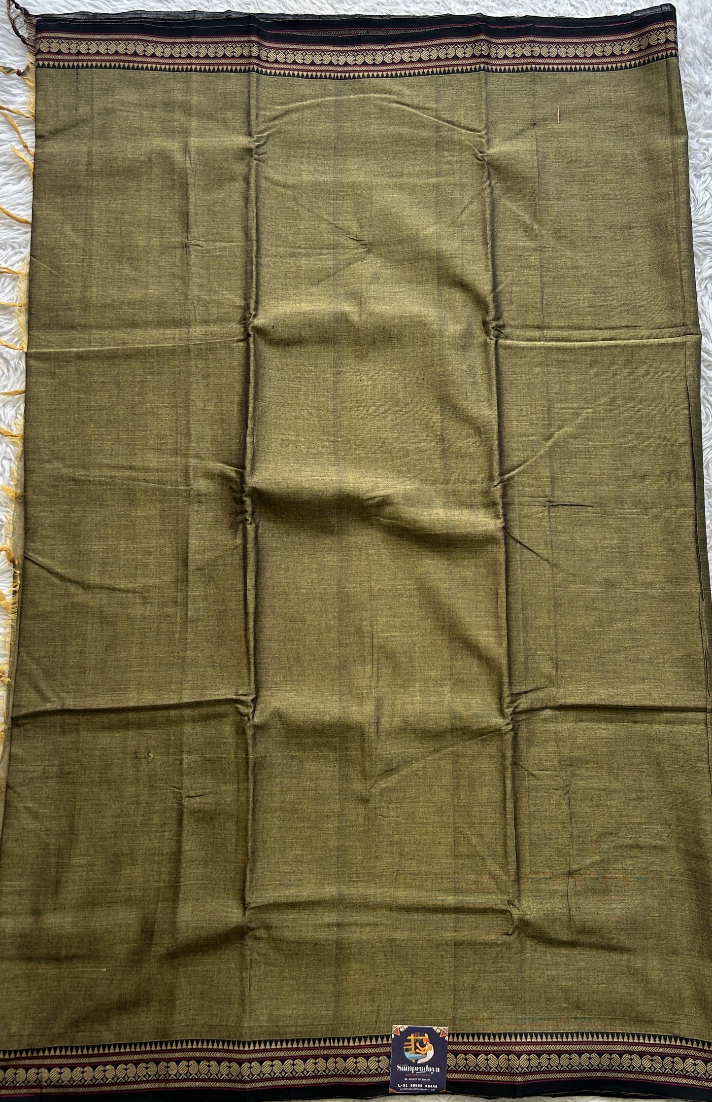 Narayanpet Cotton Saree Dark Olive Green Colored Complemented with a Thread Border. - Sampradaya Designer Studio