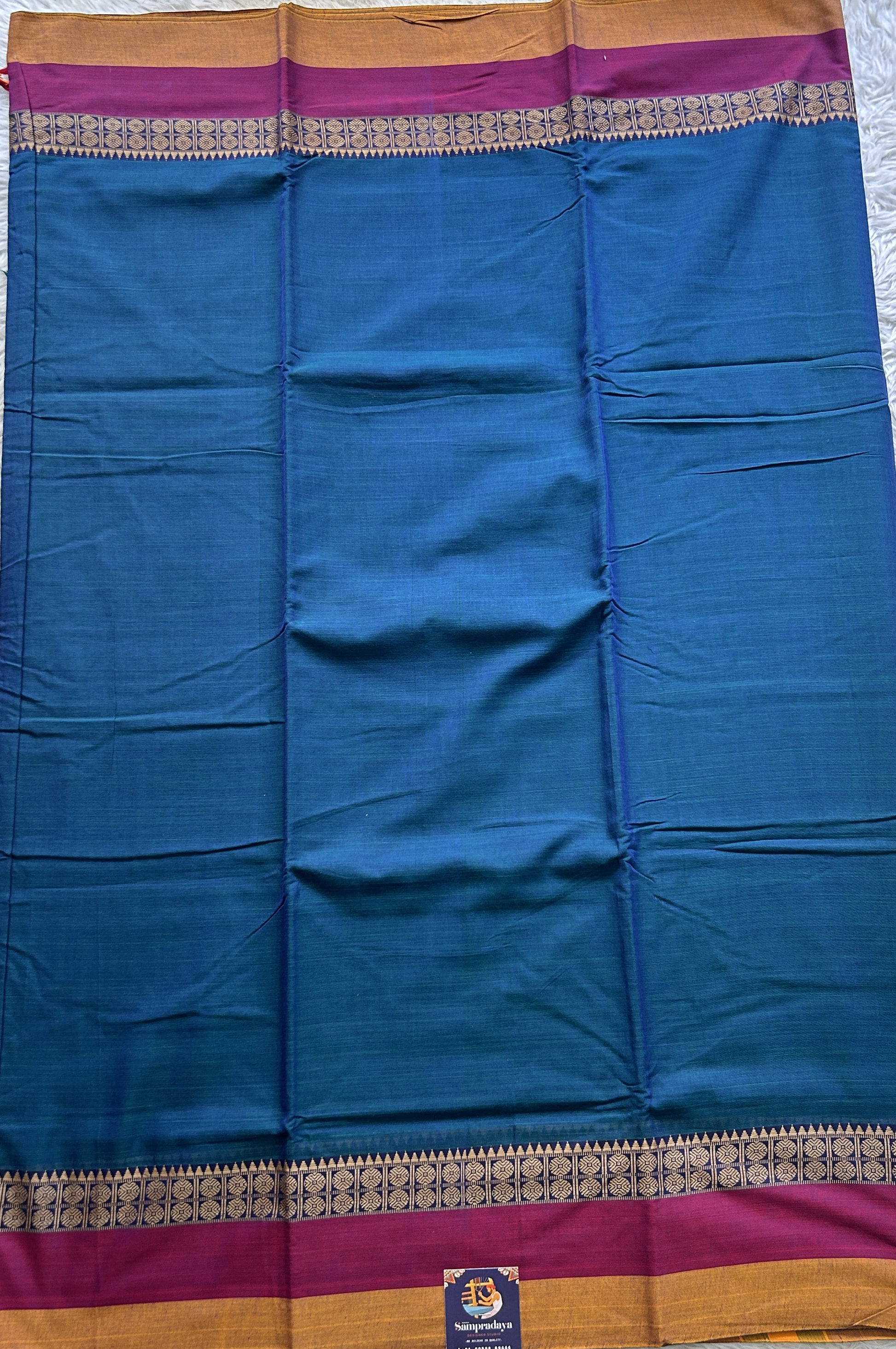 Narayanpet Cotton Saree Peacock Blue Colored Complemented with a Gap Border. - Sampradaya Designer Studio