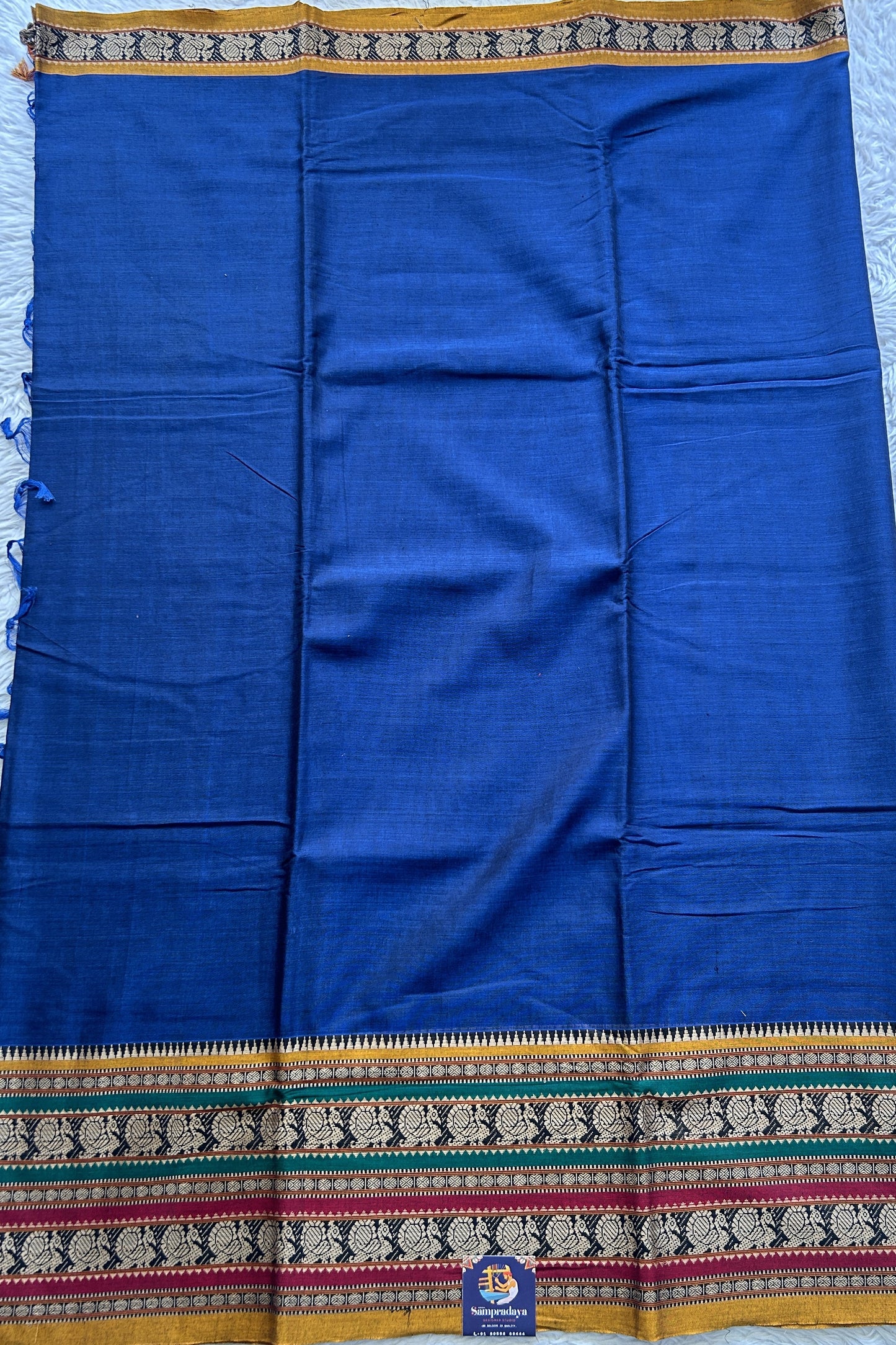 Narayanpet Cotton Saree Carbon Blue Colored Complemented with a Thread Border. - Sampradaya Designer Studio