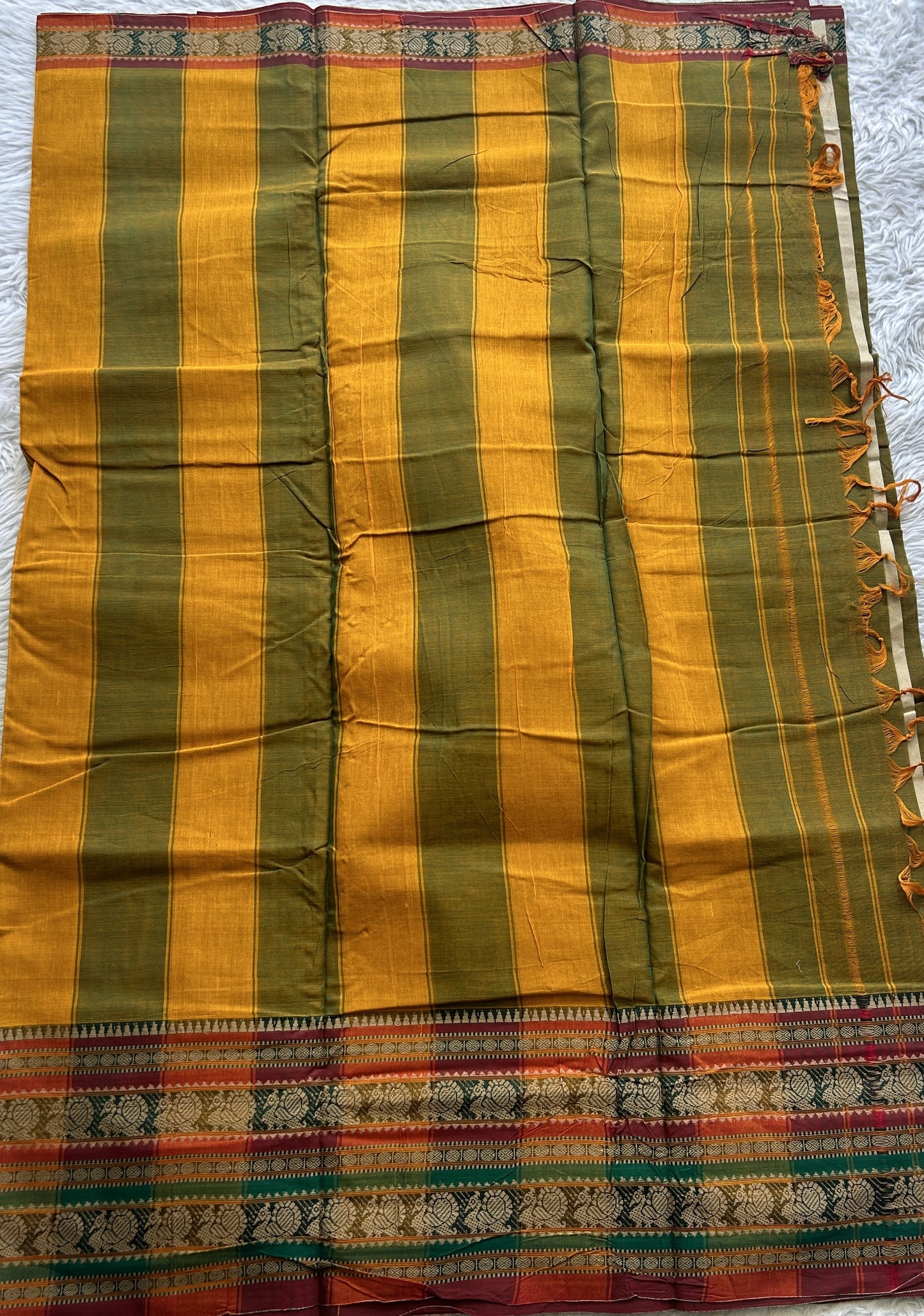 Narayanpet Cotton Saree Olive Green Colored Complemented with a Thread Border. - Sampradaya Designer Studio