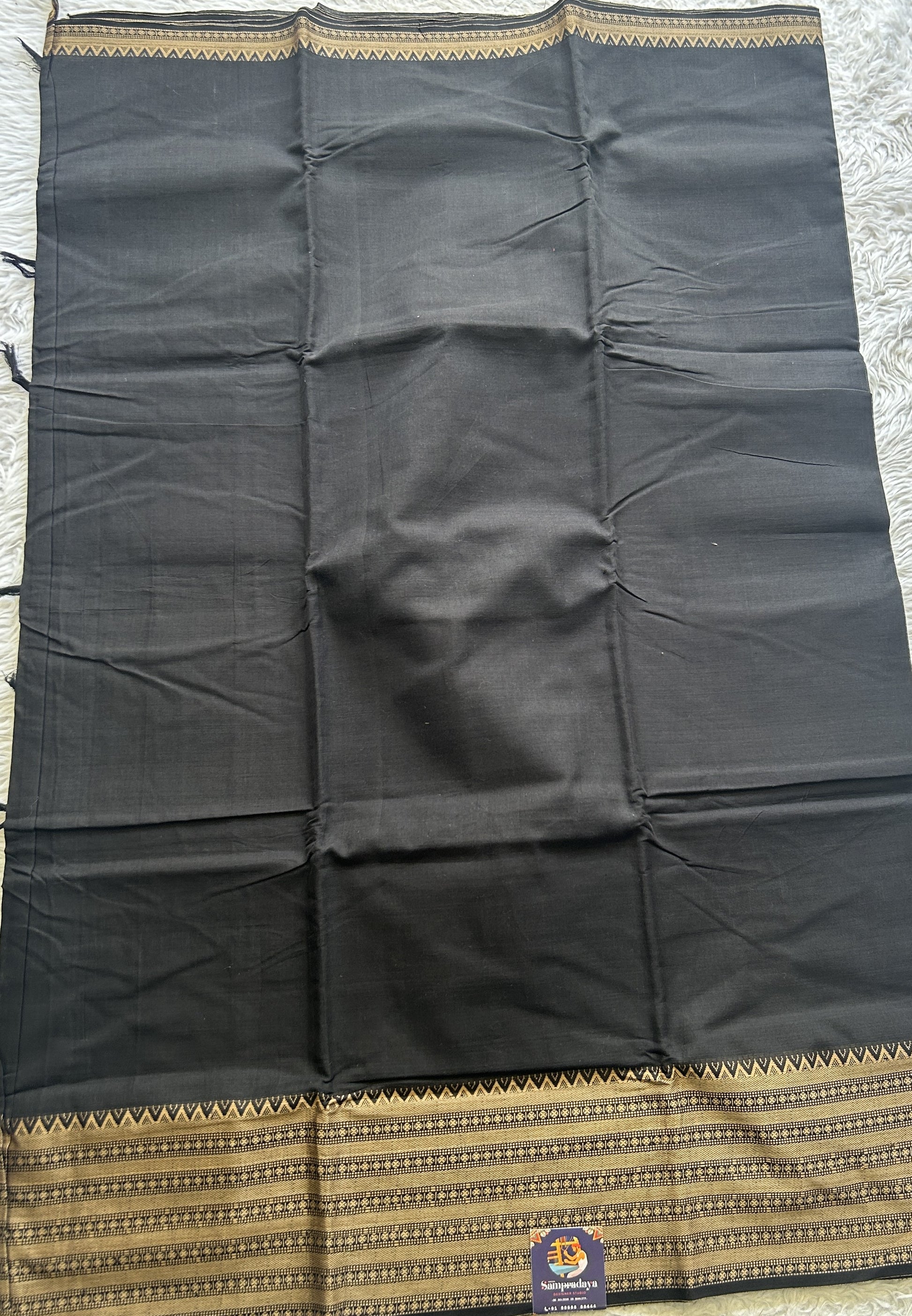 Narayanpet Cotton Saree Black Colored Complemented with a Gap Border. - Sampradaya Designer Studio