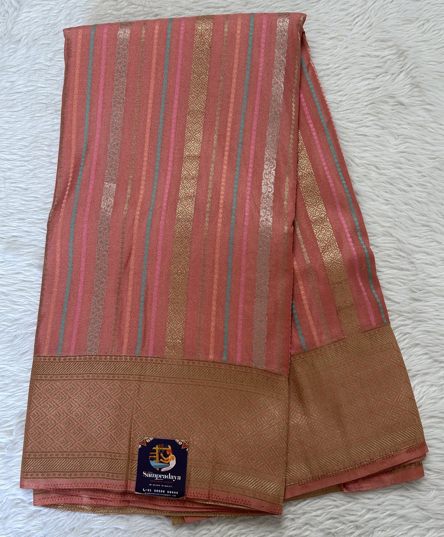 Banarasi Fancy Saree Pink Colored Complemented with a Zari Border. - Sampradaya Designer Studio