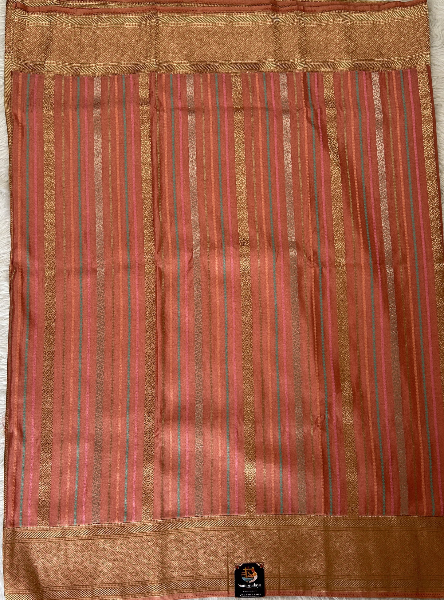 Banarasi Fancy Saree Pink Colored Complemented with a Zari Border. - Sampradaya Designer Studio