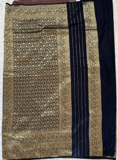 Banarasi Fancy Saree Rust Colored Complemented with a Navy Blue Zari Border. - Sampradaya Designer Studio