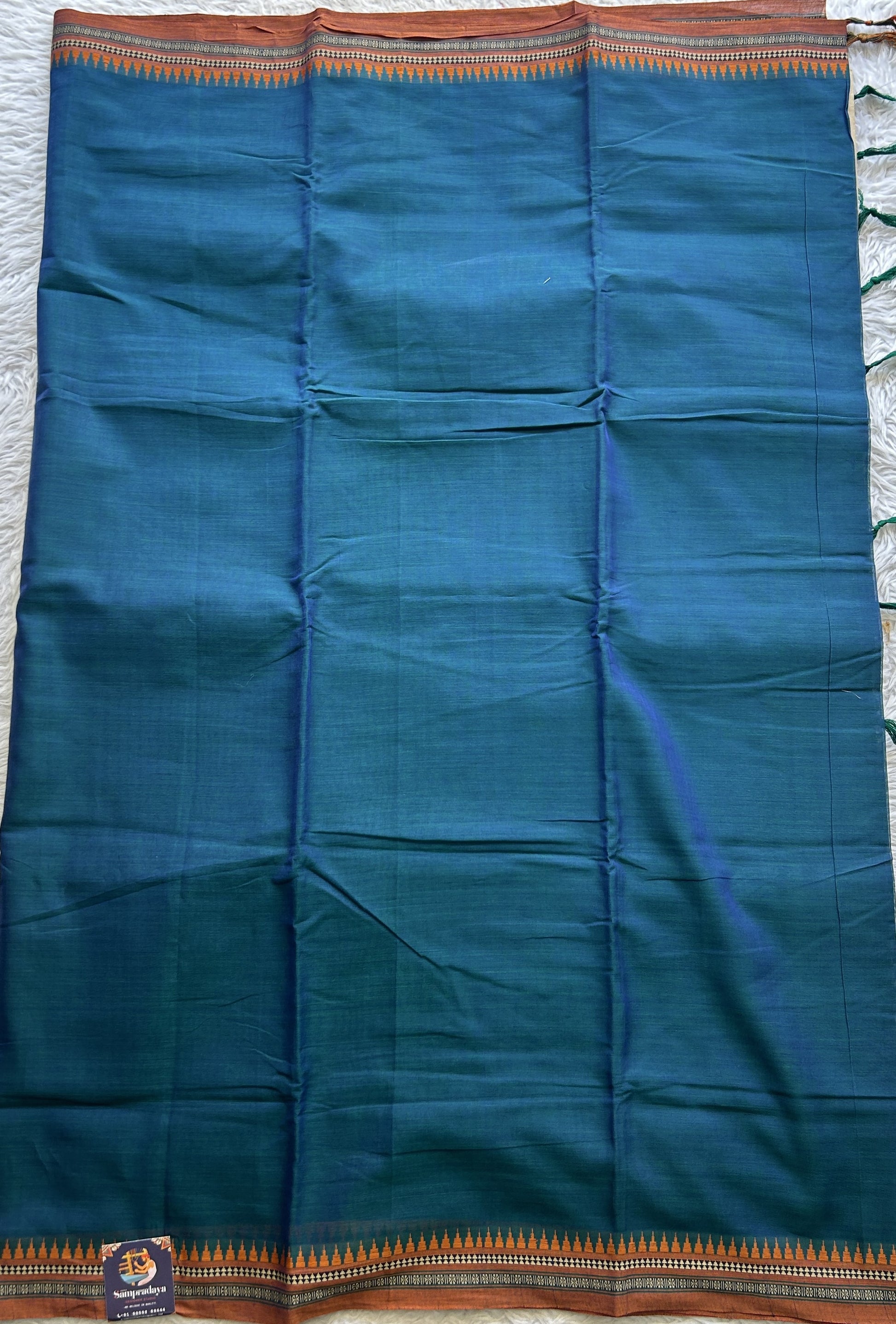 Narayanpet Cotton Saree Peacock Blue Colored Complemented with a Orange Thread Border. - Sampradaya Designer Studio