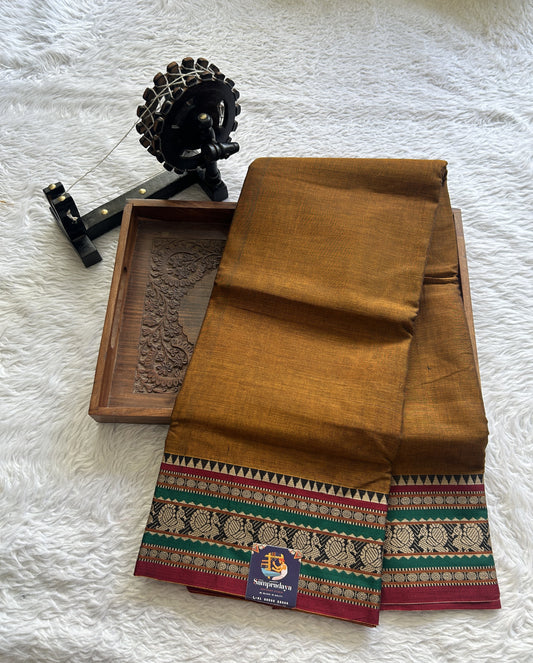 Narayanpet Cotton Saree Dark Mustard Colored Complemented with a Thread Border. - Sampradaya Designer Studio