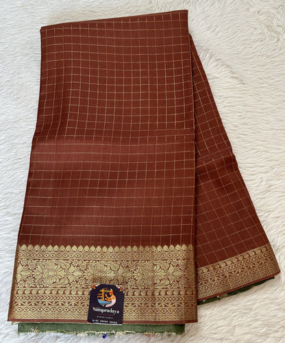 Banarasi Fancy Saree Rust Colored Complemented with a Zari Border. - Sampradaya Designer Studio