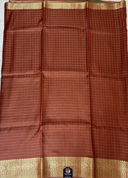 Banarasi Fancy Saree Rust Colored Complemented with a Zari Border. - Sampradaya Designer Studio