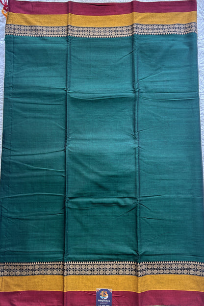 Narayanpet Cotton Saree Bottle Green Colored Complemented with a Double Border. - Sampradaya Designer Studio