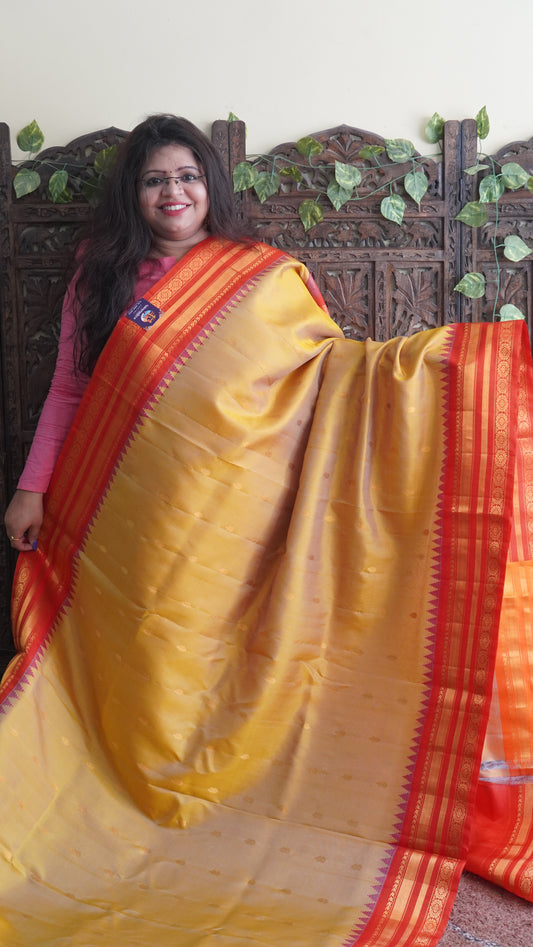 Gadwal Silk Saree Dark Yellow Colored Complemented With a Red Color Zari Border - Sampradaya Designer Studio