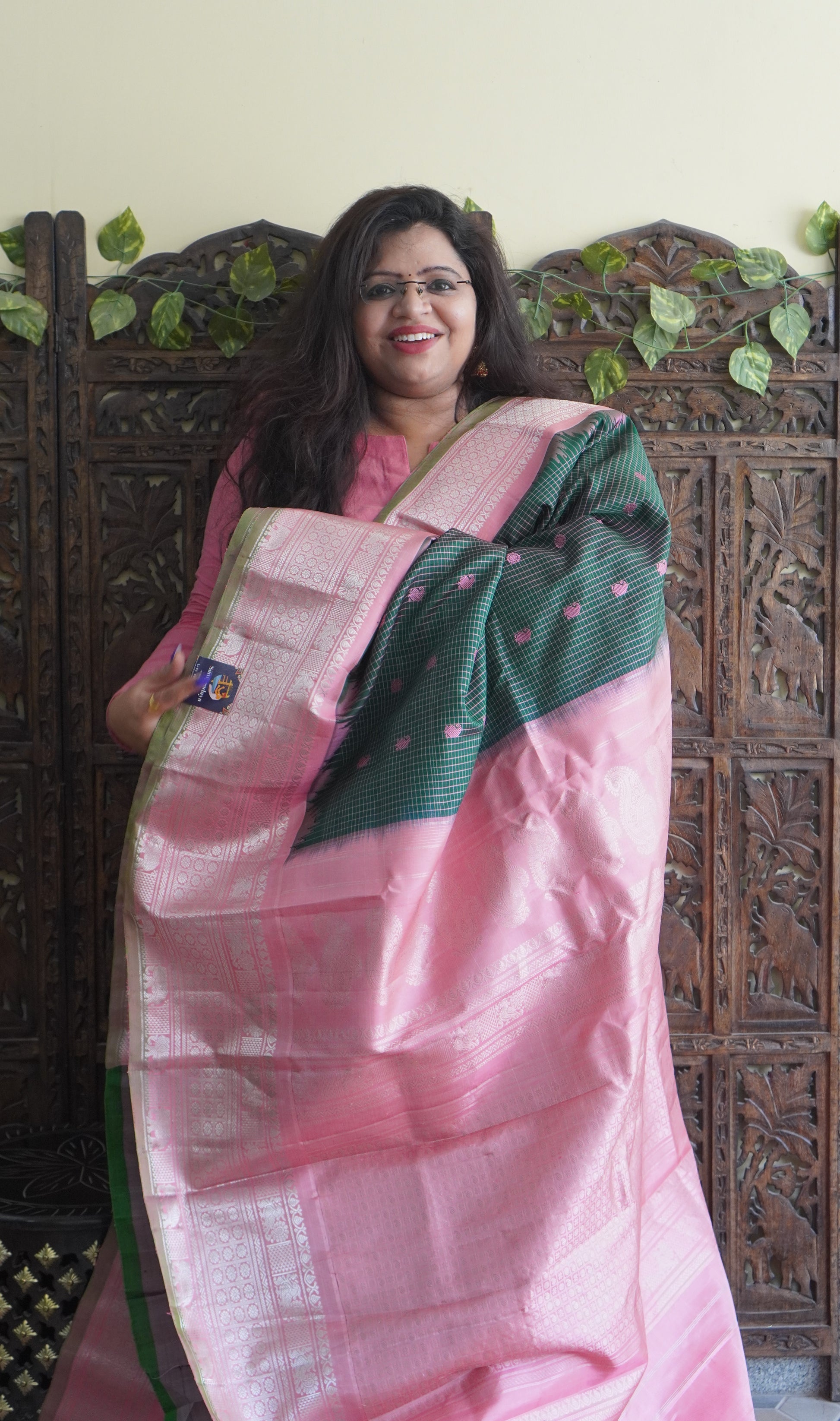 Gadwal Silk Saree Bottle Green Colored Complemented With a Zari Border - Sampradaya Designer Studio