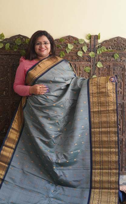 Gadwal Silk Saree Elephant Gray Colored Complemented With a Zari Border - Sampradaya Designer Studio