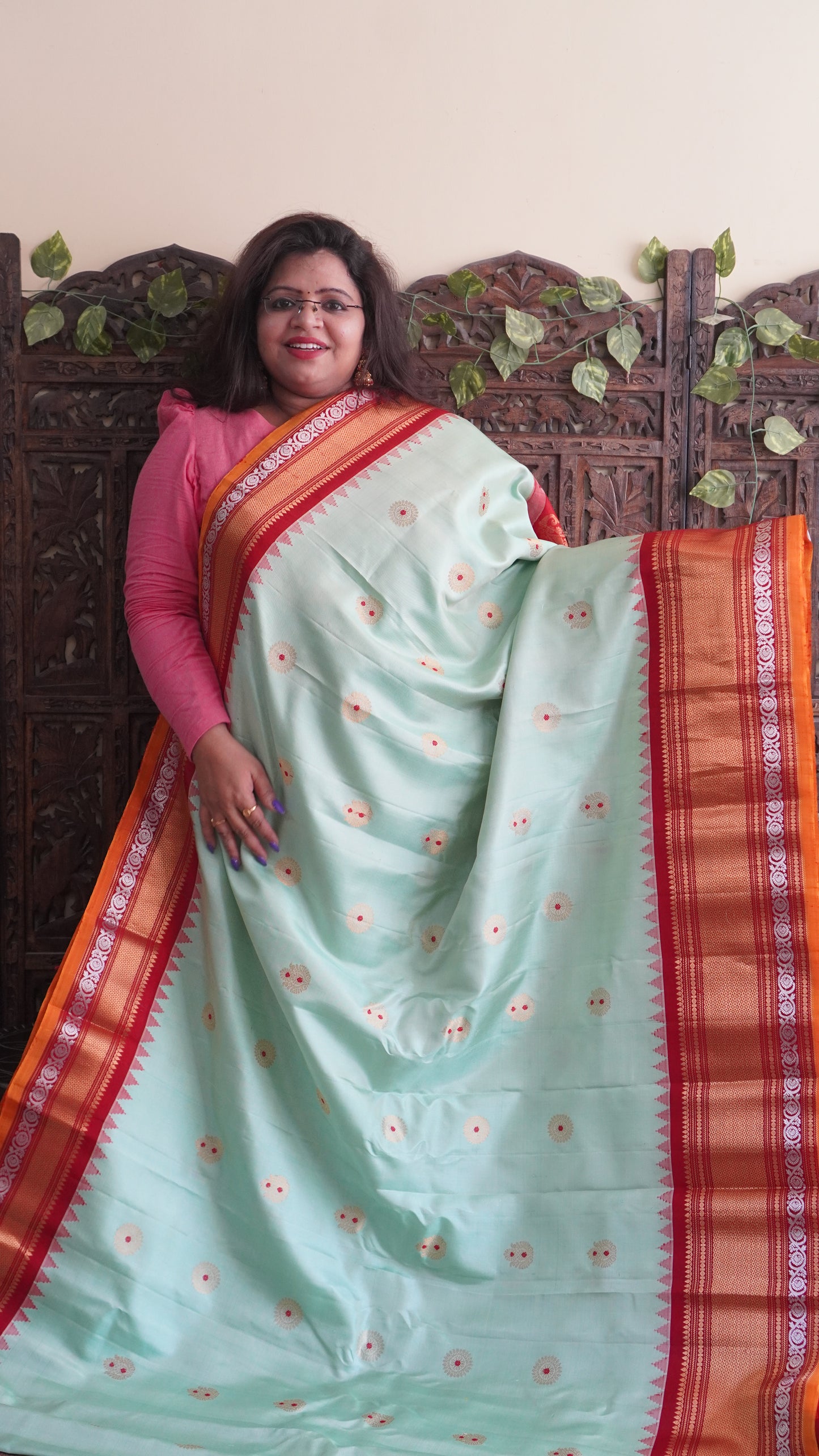 Gadwal Silk Saree Light Green Colored Complemented With a Red Zari Border - Sampradaya Designer Studio