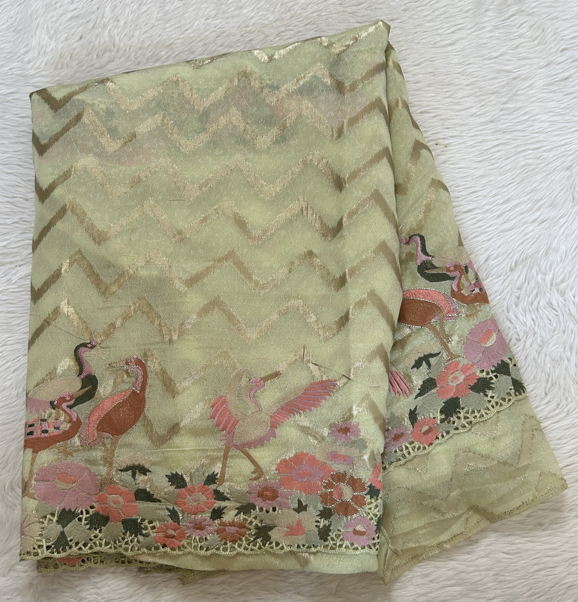 Tissue Georgette Designer Saree Green colored complemented with a Cutwork border. - Sampradaya Designer Studio