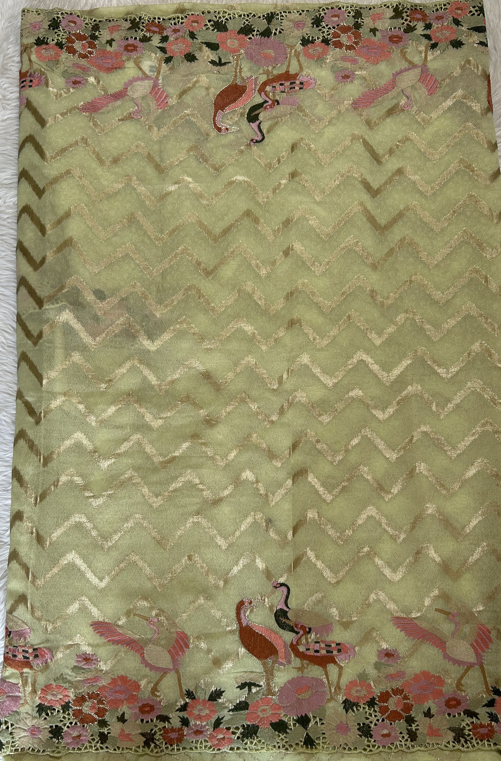 Tissue Georgette Designer Saree Green colored complemented with a Cutwork border. - Sampradaya Designer Studio