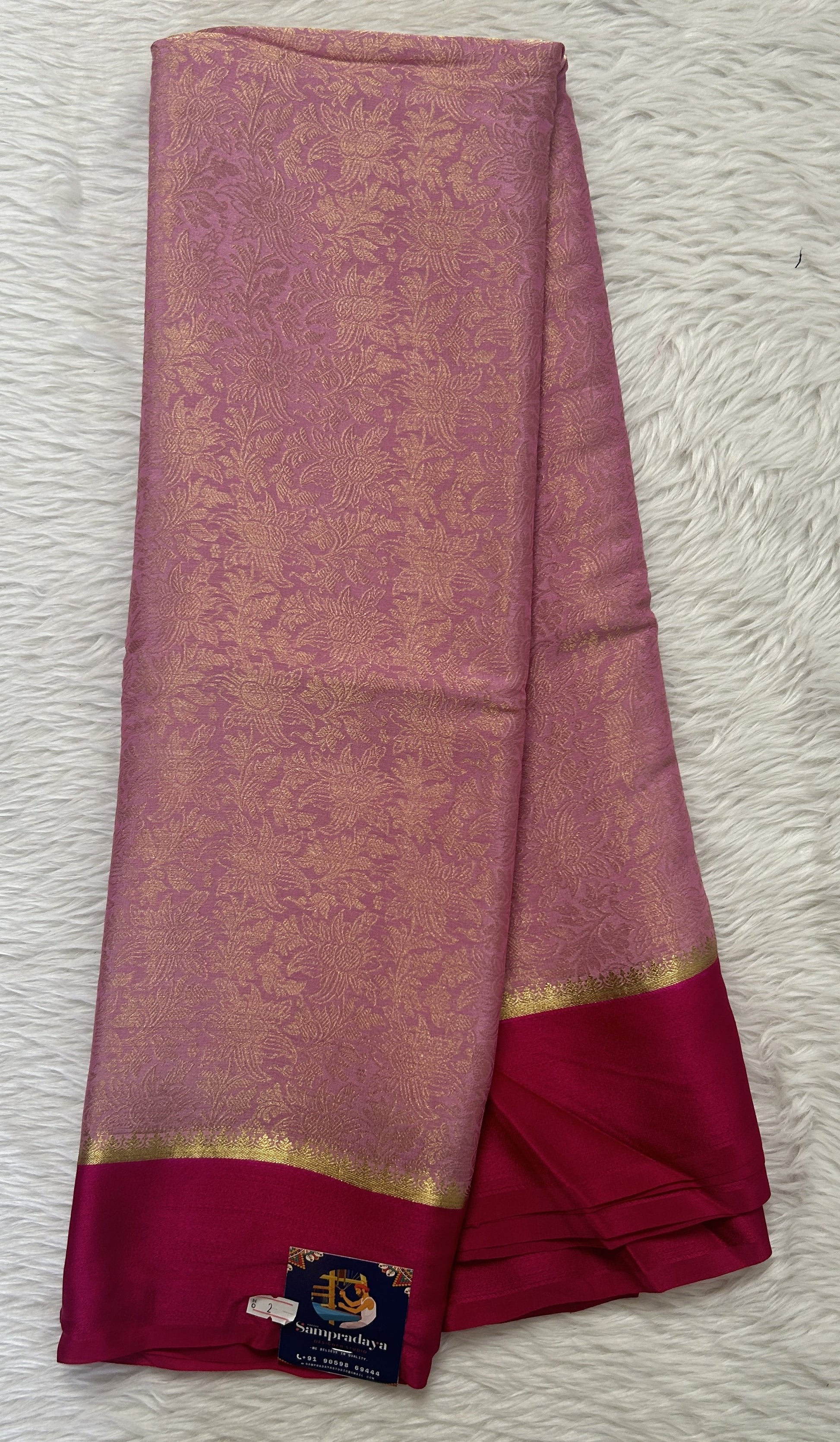 Mysore Crepe Silk Saree Baby Pink Colored Complemented with a Pink Zari Border. - Sampradaya Designer Studio